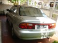 DIJUAL MAZDA 323 LANTIS THN 96 MANUAL SILVER METALIC