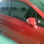 Jual Honda jazz A/T merah tahun 2006