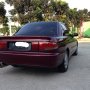 Mitsubishi Lancer Glxi Evo 3 Merah Metalik