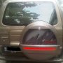 Jual isuzu panther grand touring A/T tahun 2005 coklat