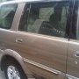 Jual isuzu panther grand touring A/T tahun 2005 coklat