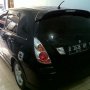 Jual suzuki aerio 2004 04 dx m/t hitam gress