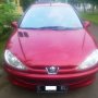 Jual peugeot 206 MT sporty tahun 2002 merah maroon