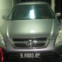 Jual Honda CRV 2004 abu-abu tua metalik.