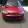 Jual peugeot 206 th. 2002 M/T merah metalik 