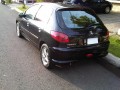 PEUGEOT 206 TRIPTONIK THN 2005 HITAM METALIK