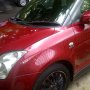 Over Kredit suzuki swift gt th 2009 at merah