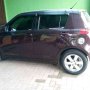 Jual Suzuki Swift 2010 AT Merah Istimewa Plat W