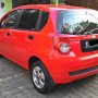 JUAL CHEVROLET AVEO 2009 MERAH