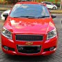 JUAL CHEVROLET AVEO 2009 MERAH
