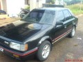 Mazda 323 Elite XG-S 1.5i 1987 Tangan 1
