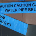 tanda peringatan,under ground warning tape caution water pipe below
