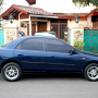 Mazda 323 Familia 1.8 DOHC Thn 97. Manual, Biru Metalik