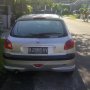 dijual over kredit peogeot 206 silver thn 2004