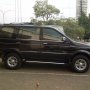 Jual Isuzu Panther Grand Touring 2012 Hitam baru 4 bulan pakai 99% new