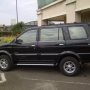 Jual Isuzu Panther Grand Touring 2012 Hitam baru 4 bulan pakai 99% new